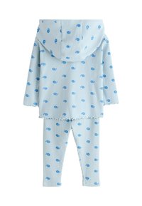 Light blue hooded top and leggings set with ribbed texture. Features small blue floral print and ruffled hem on the top.