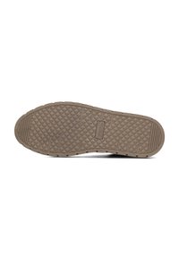 Rubber shoe sole in a light brown color. Features a textured diamond pattern for grip and horizontal grooves near the toe area.