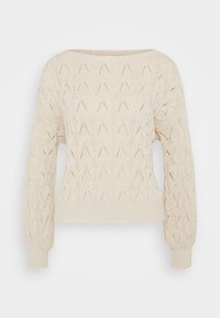 Krämfärgad stickad tröja med bred halsringning, texturerat mönster av V-former och ribbade ärmslut och nederkant. Lätt och andningsbar tyg.