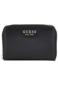 Portafoglio nero realizzato in pelle liscia con chiusura a zip. Presenta un logo "GUESS EST 1981" in tonalità dorata sul fronte. Design minimalista.