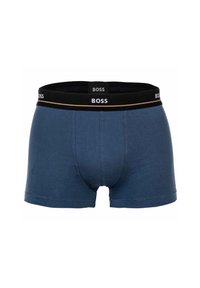 Boxers en coton bleu foncé pour homme avec une taille élastique noire arborant le logo « BOSS » en accents blancs et dorés. Texture lisse et design ajusté.