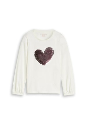 Witte blouse met lange mouwen met elastische manchetten en een groot glanzend donkerpaars pailletten hart ontwerp op het voorste midden.