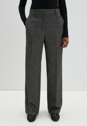 Gray, high-waisted, wide-leg trousers made from textured fabric with front pockets and neat stitching. Paired with black shoes.