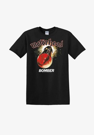 Sort bomulds T-shirt med et grafisk print af en bombe med en rød spids, omgivet af eksplosioner, og teksten "Motörhead BOMBER" i stiliseret skrifttype.