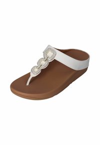 Witte slipper sandalen met een gestructureerde bruine zool, voorzien van drie met elkaar verbonden vierkante accenten versierd met rhinestones op de band.