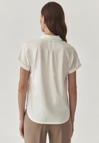 TATUUM AMBRA - Polo majica - offwhite