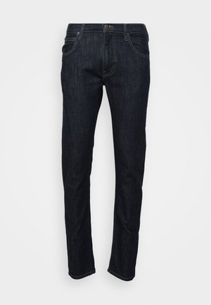 Mørkeblå denimjeans med rett ben-design, med knappelukking, beltehemper og for- og baklommer. Ingen synlige mønstre.