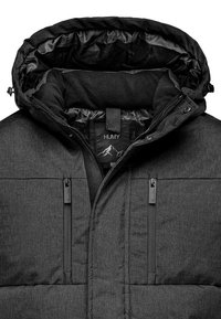Black padded jacket with a high collar, zipper pockets, and smooth lining. Features a label with "HUMY" inside the collar. Textured fabric exterior.