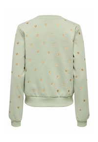 Sweatshirt vert menthe avec un motif à pois de petits coeurs dorés, des poignets côtelés et un ourlet. Texture douce, design décontracté.