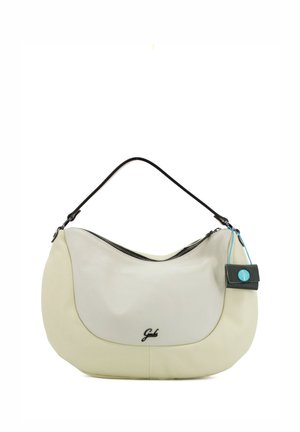 Borsa a tracolla in pelle crema e bianca con manico nero, chiusura con cerniera, piccolo etichetta nera con bottone blu sul lato.