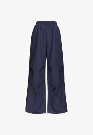 Navy blue wide-leg pants with elastic waistband and textured fabric, displayed on a white background.