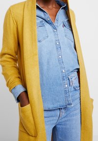 s.Oliver Kardigan - dark yellow