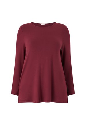 Camiseta de manga larga burdeos fabricada en tela suave. Presenta un escote redondo y un corte relajado con un dobladillo recto. Diseño sencillo, sin estampados ni acentos.