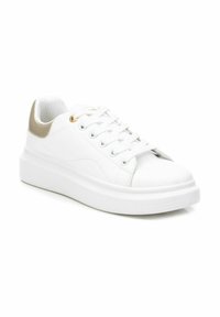 White sneaker with a smooth leather upper, gold accent on the heel, and white thick sole. Features traditional lacing and rounded toe.