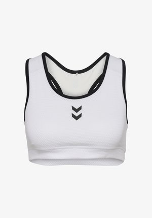 Vit sport-bh med texturerad yta, svart kant och utskärningsdesign på baksidan. Har en svart chevron-logga på framsidan.