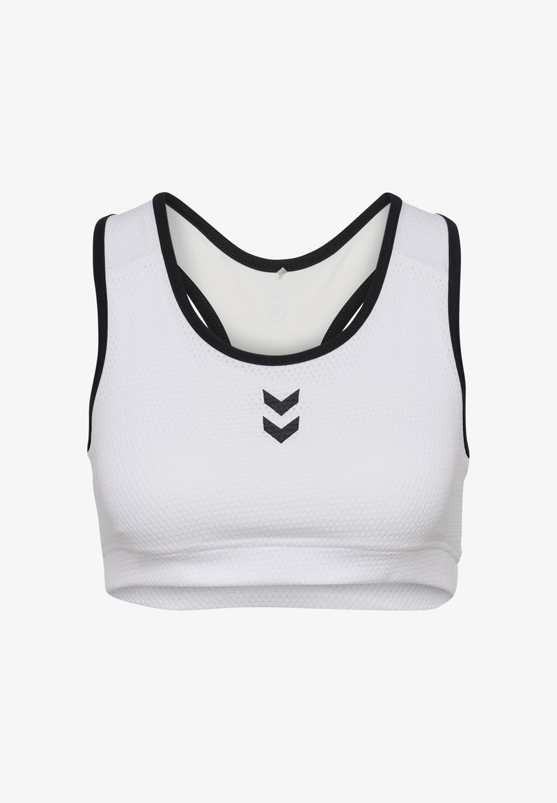 Vit sport-bh med texturerad yta, svart kant och utskärningsdesign på baksidan. Har en svart chevron-logga på framsidan.