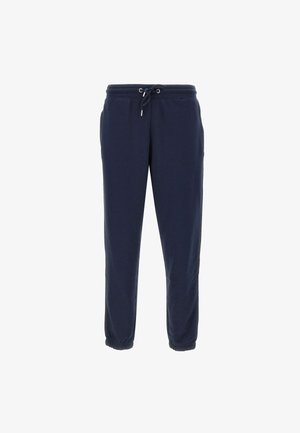 Pantaloni da tuta blu navy realizzati in tessuto morbido, con vita elasticizzata e cordoncino, tasche laterali e polsini elasticizzati alle caviglie.