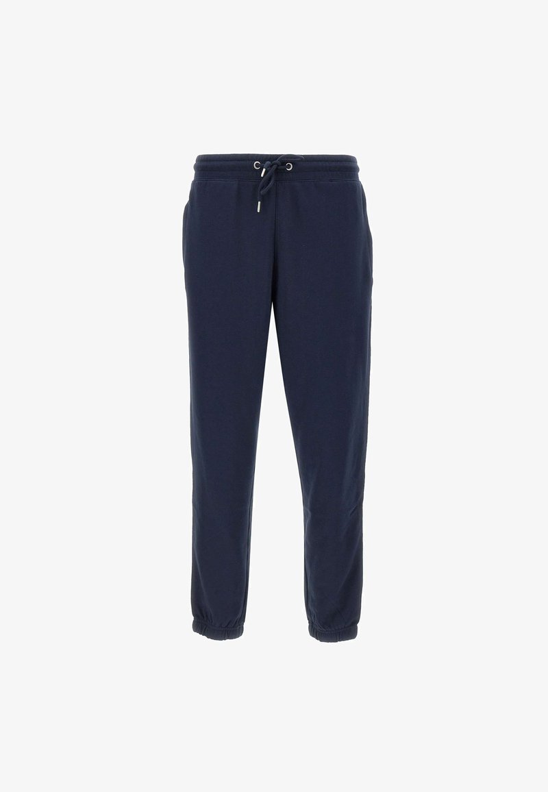 Pantaloni da tuta blu navy realizzati in tessuto morbido, con vita elasticizzata e cordoncino, tasche laterali e polsini elasticizzati alle caviglie.