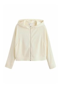 Sudadera con cremallera en crema de canalé corto, con un perfil ajustado, capucha integrada y bolsillos laterales; presenta costuras en contraste y una tela texturizada.