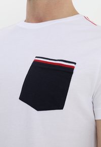 Tommy Hilfiger Triko s potiskem - white