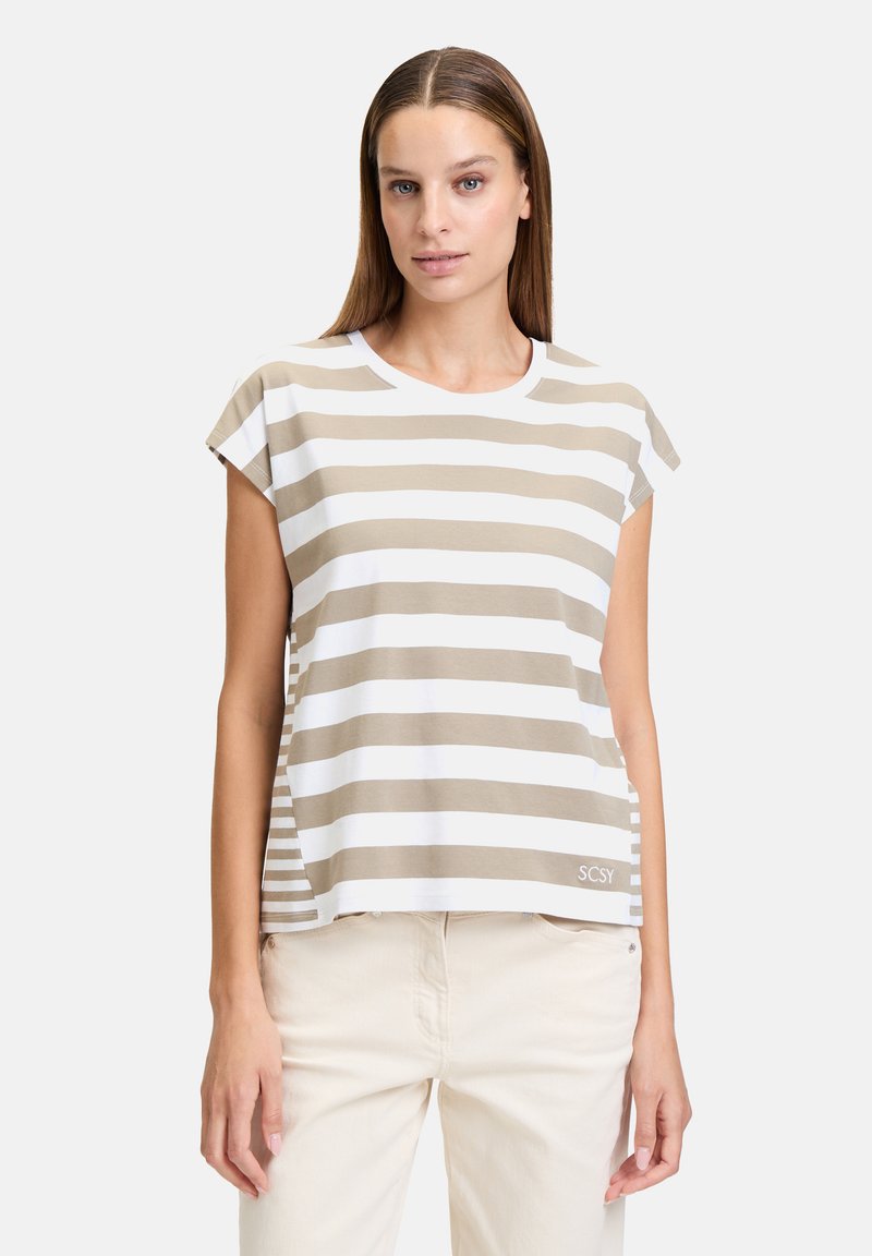Haut à manches courtes rayé en brun clair et blanc, avec un col rond, une coupe décontractée et un petit logo en bas. Tissu en mélange de coton.