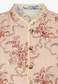 Cotton jacket featuring a floral print in pink, orange, and brown on a light pink background, with a round neck and three buttons.
