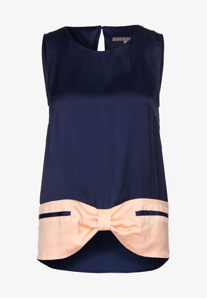 Námořnická modrá bezrukávová blůza s kulatým výstřihem, se světle broskvovou mašlí v pase a dvěma ozdobnými kapsami, vyrobená z hladkého materiálu.