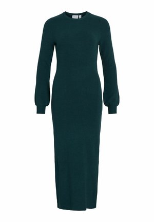 Largo vestido verde ajustado hecho de tela de punto acanalado, con cuello redondo y mangas abullonadas, que llega hasta la mitad de la pantorrilla.