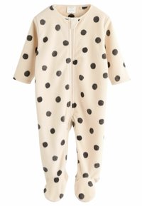 Fleece Baby-Overall in hellem Creme mit schwarzen Punkten, mit langen Ärmeln, einem vollen Reißverschluss vorne und Fußdesign.