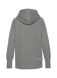 Felpa grigia con orlo e polsini a coste, presenta una cucitura centrale sulla schiena e un dettaglio testuale sul lato destro in basso. Tessuto morbido e strutturato.