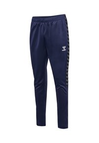 Marineblauwe trainingsbroek van lichtgewicht stof, met een zwart chevron patroon aan de zijkant en een elastische tailleband voor comfort. Logo aan de voorkant.
