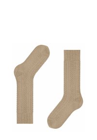 Calze beige lavorate a maglia caratterizzate da un motivo testurizzato con polsini a coste. Realizzate in tessuto morbido, sono progettate per offrire comfort e calore.