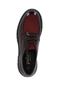 Burgundy leather shoe with a shiny finish, suede accents, round toe, black laces, and a textured rubber sole. Insole marked "made in Portugal."