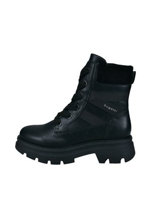 Black leather ankle boot with a ribbed collar, lace-up front, and chunky sole. Features elastic side panels and a textured finish.