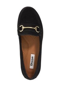 Black suede flat shoe featuring a gold metal accent on the front, with a smooth leather interior and perforated design for breathability.