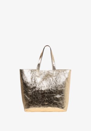 Metallic gold tote bag with a textured finish, featuring two sturdy handles and an open top design. Smooth material with a shiny, reflective surface.