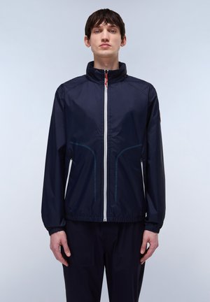 Navy waterproof jacket with high collar, zippered front, and elastic cuffs. Features light blue accents and pockets with zipper closures.