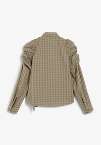 Beige og hvid ternet bluse med lange ærmer, rynkede skuldre og knappede manchetter, vist fra ryggen på en hvid baggrund.