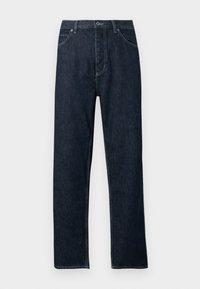 Mørk denim jeans med rett benpassform, fem lommer, blå søm-detaljer og knappelukking. Rene, uten synlige mønstre.