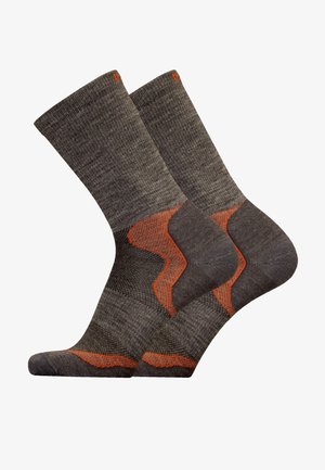Gray socks with orange accents. Ribbed top, reinforced heel and toe. Textured pattern on the footbed for enhanced grip and comfort.