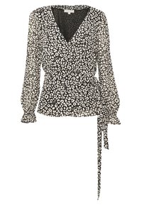 Blouse noire à imprimé léopard blanc, manches longues avec poignets rufflés, décolleté en V, et une ceinture à nouer à la taille.