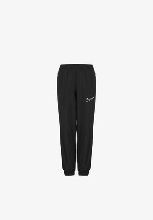 Černé sportovní kalhoty s elastickým pasem a manžetami. Na levém stehně se nachází bílé logo Nike. Vyrobené z lehkého materiálu.