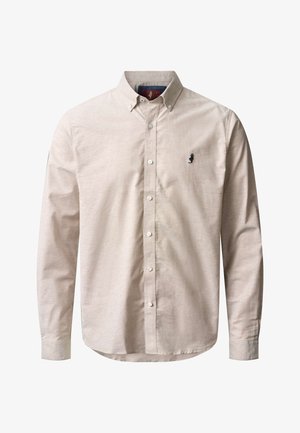 Beżowa koszula na długi rękaw zapinana na guziki, z kołnierzykiem na guziki i małym, ciemnym haftowanym logo na lewej piersi.