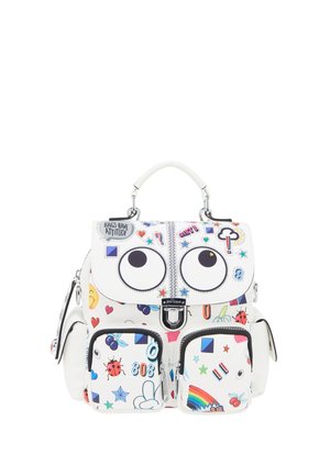White backpack with cartoon eyes, colorful doodles, ladybugs, stars, rainbow, and the phrase "Bags have attitude" on the flap.