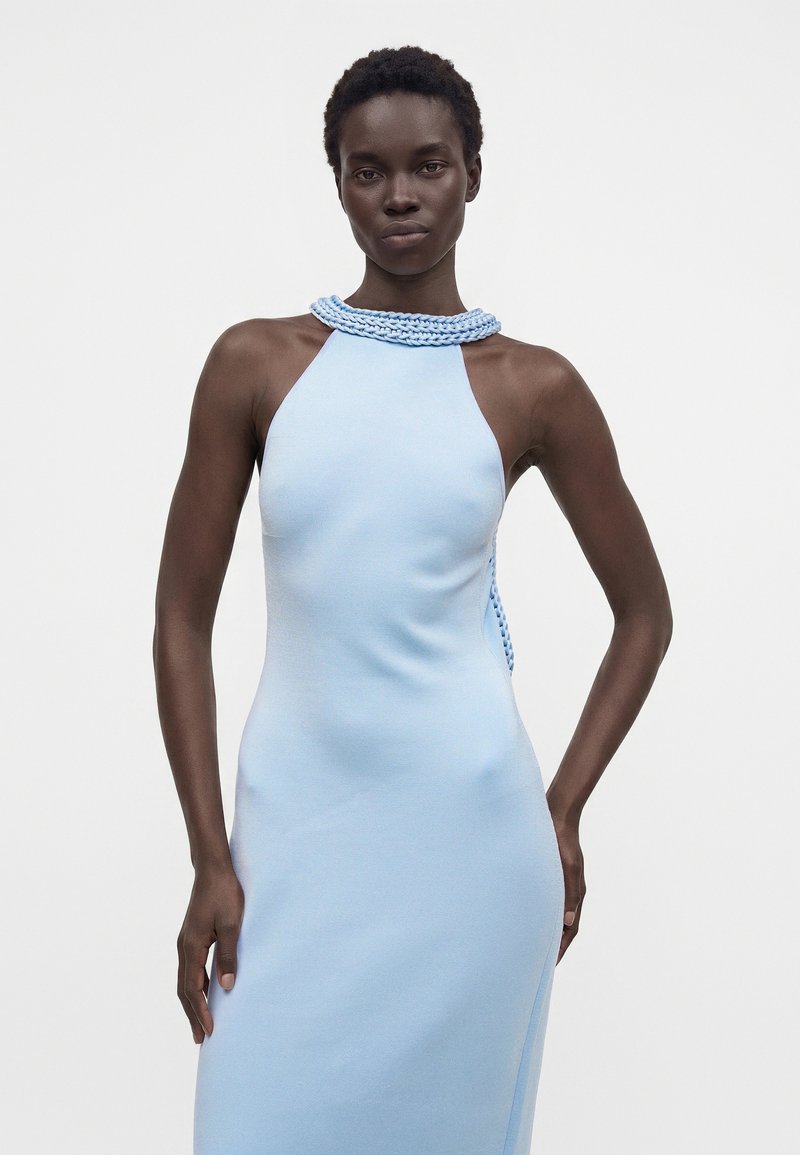 cult gaia light blue dress A closer look at the Issey Dress, our Cult favorite masterpiece, now in a light blue hydrangea hue. Shes our beaded mini icon that catches the light every time she steps out. What color should we