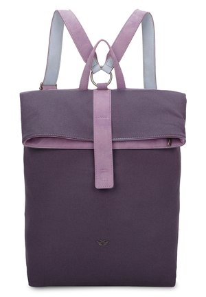 Purple canvas backpack with a fold-over top, lavender accents, adjustable straps, and a circular hardware loop detail. Smooth texture.