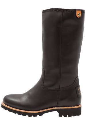 Black leather knee-high boot with a rounded toe, textured surface, contrasting tan sole, and a logo patch near the base.