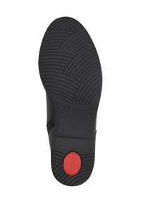 Suela de zapato negra con un patrón texturizado y acanalado para mayor agarre, con un logo circular rojo que dice "Comfort" y una marca de tamaño de 37.