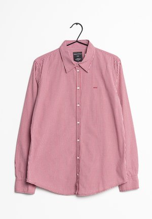 Camicia a maniche lunghe a quadri rossi e bianchi con colletto button-down. Presenta una piastra frontale con bottoni e un piccolo logo sul lato sinistro del petto.