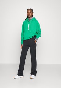 Guess BRENDA STRAIGHT LEG PANT - Tepláky - blue graphite grey